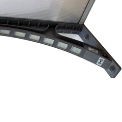 Copertină PREMIUM LUMI cu senzor de lumină și panou solar pentru ușă, 150x100 cm marchiză acoperiș adăpost, gri-transparent